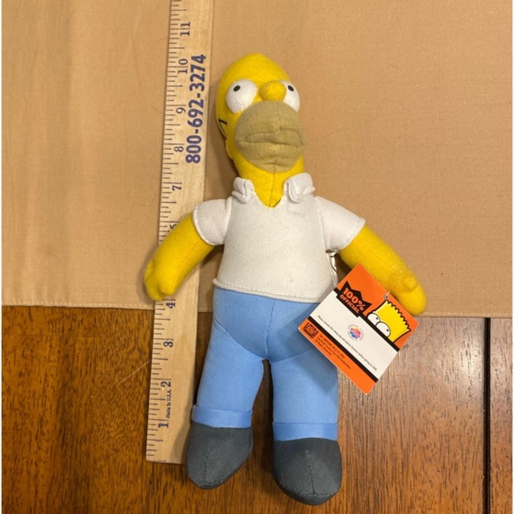 Homer Simpson stuffed doll sold by Nanco products.  Collectible from 2005‎